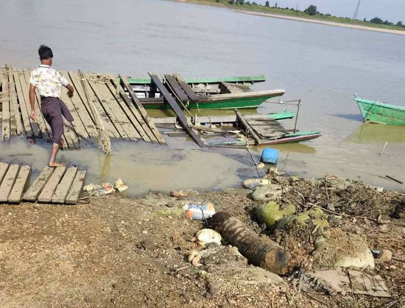 Myanmar junta airstrikes damage boat at Muhtaw village ferry port in Kani Township